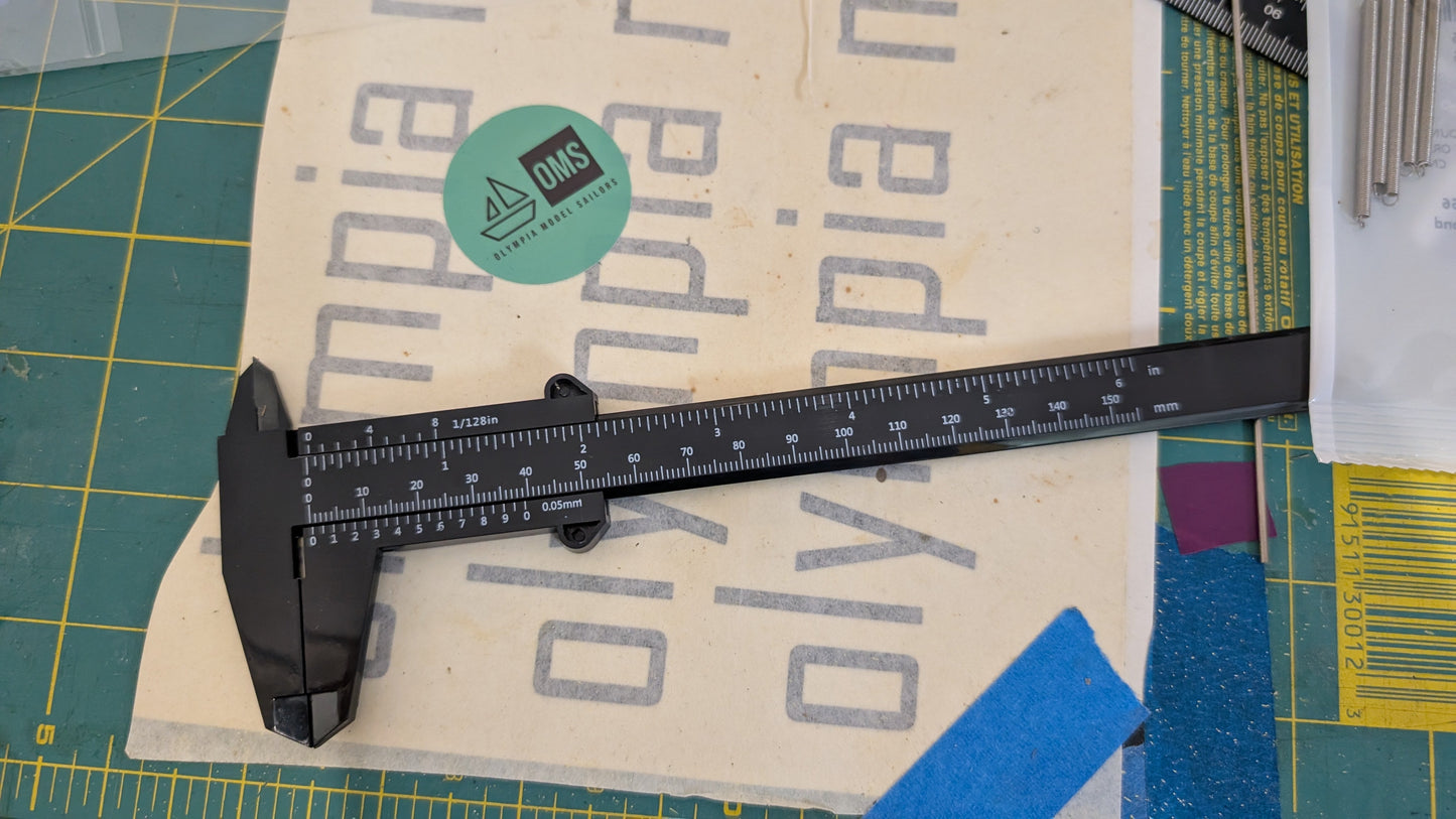 Metric Caliper Plastic (cheap)